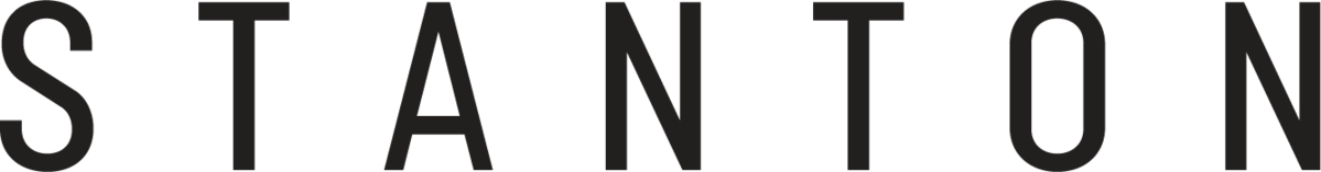 Stanton Carpet Logo, black letters on clear background, links to Stanton Carpet's website