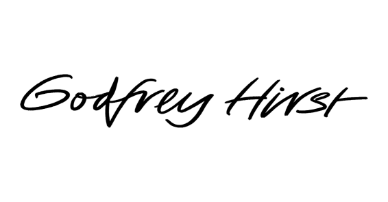 Godfrey Hirst in black cursive letters on white background