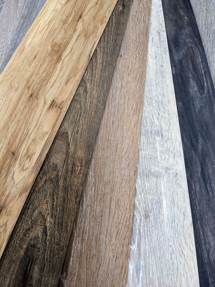 Luxury Vinyl Plank & Tile sprayed in wood color, white and blue