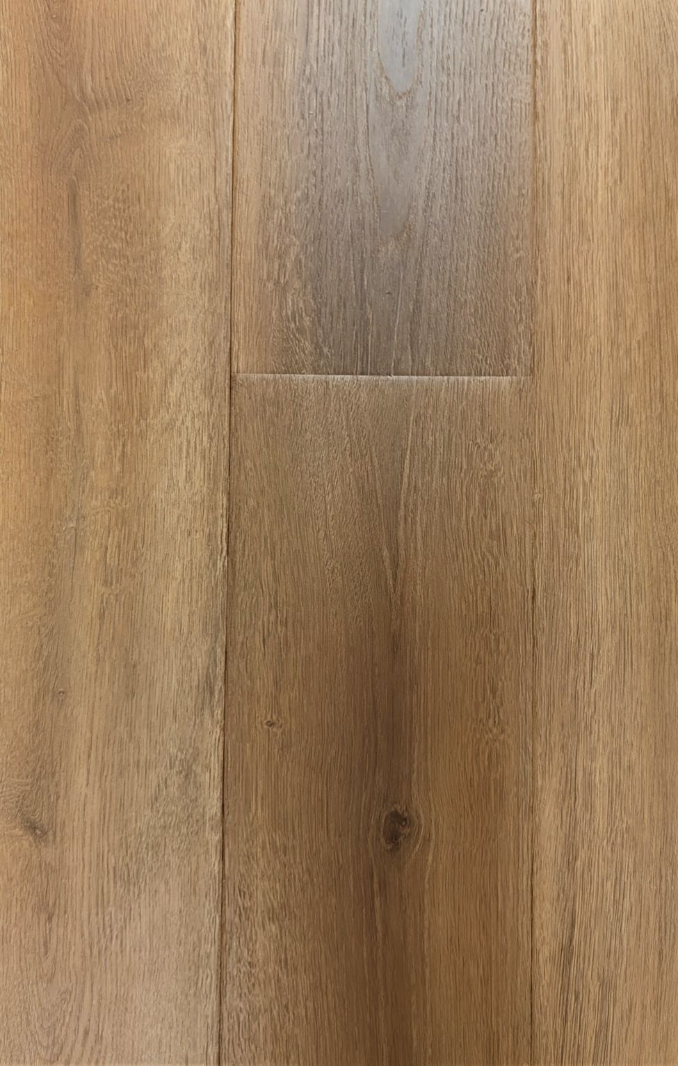 Laminate flooring in a medium brown wood color
