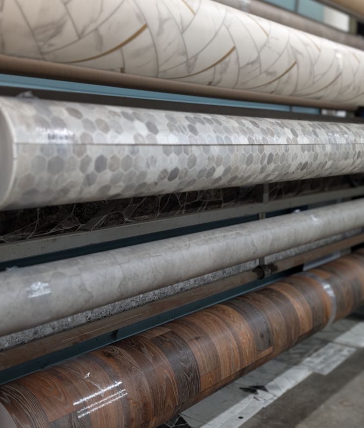 Mullen's Factory Direct Flooring Warehouse vinyl rolls in various colors