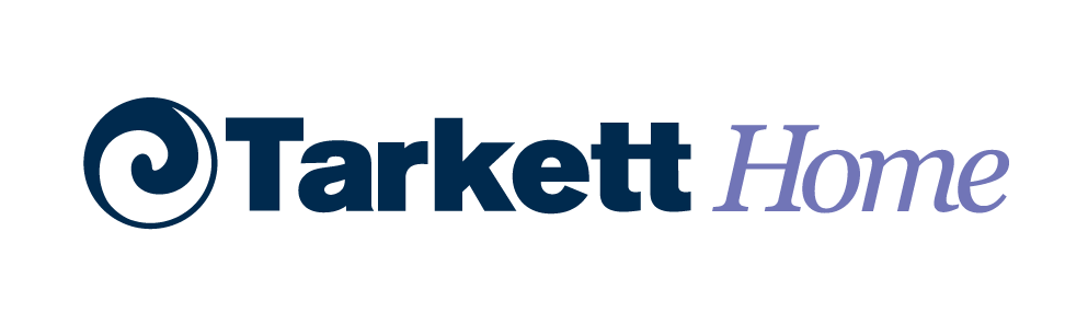 Tarkett Home logo, Tarkett in dark blue block letters, Home in purple italic letters, blue and clear swirl on the left. Logo on clear background