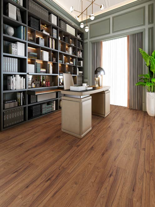 Home office with large window, wainscoting, and built-in bookshelves, over a medium brown laminate floor