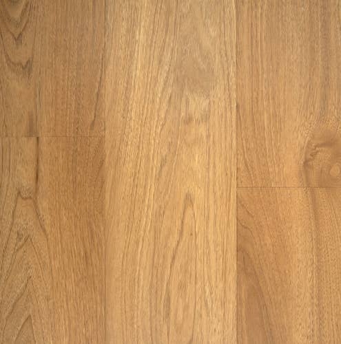 Peak Point Wheat sample, a gold laminate with light brown woven throughout, subtle knots, and woodgrain texture