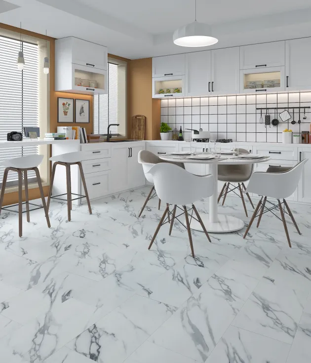 Retro-inspired kitchen with vintage fridge, white cabinetry, breakfast nook, and table over white and gray stone-look tile