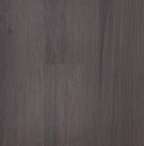 Studio Grove Thunder sample, a laminate floor with woodgrain texture and medium gray tonal variation for a clean, calm feel