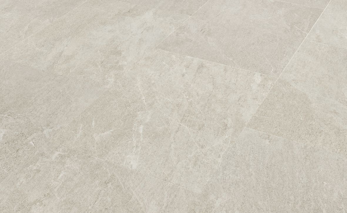 Sample of Alpine Quartzite LVT, with cool white and cream stone look