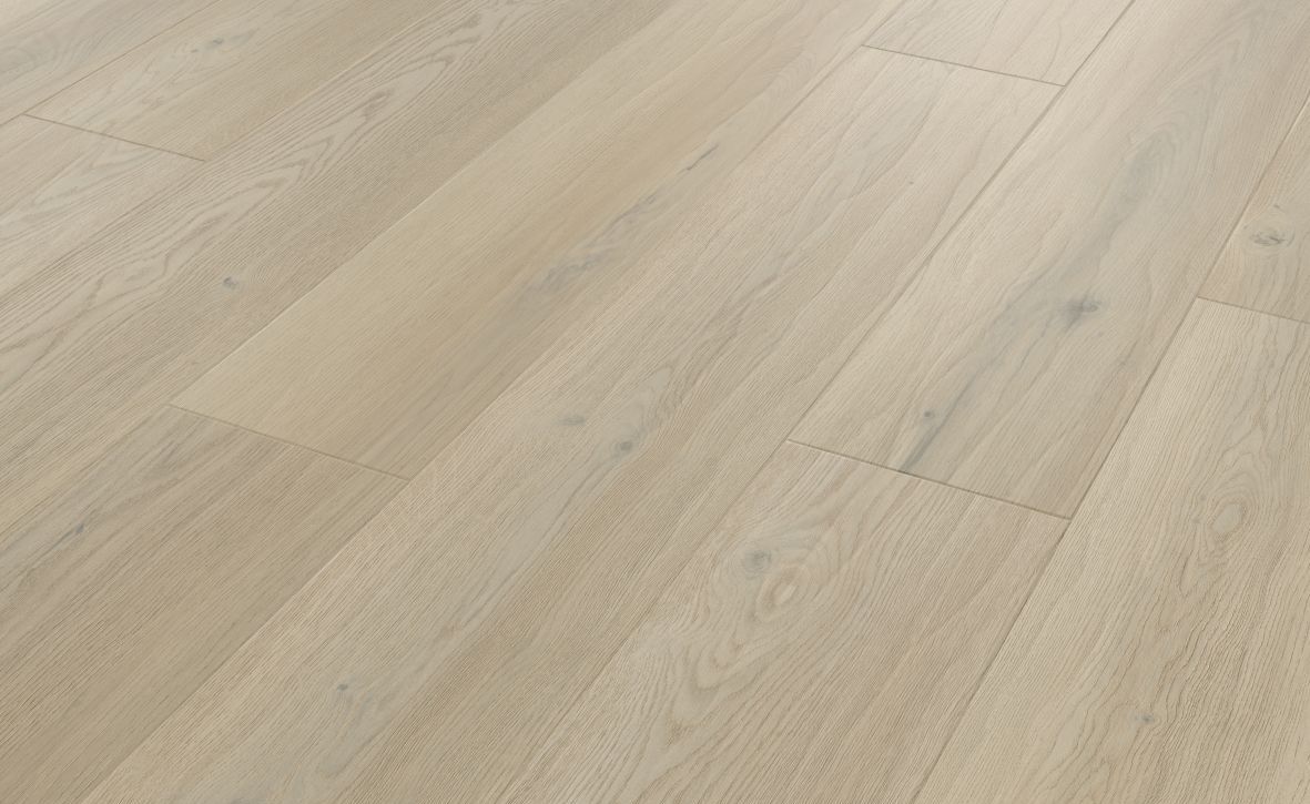 Sample of Basque Oak luxury vinyl plank, a beige/taupe plank with realistic woodgrain and texture