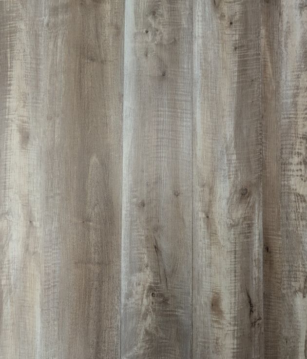 Tavern Oak luxury vinyl plank sample showing grays and taupes for a rustic, slightly weathered wood look