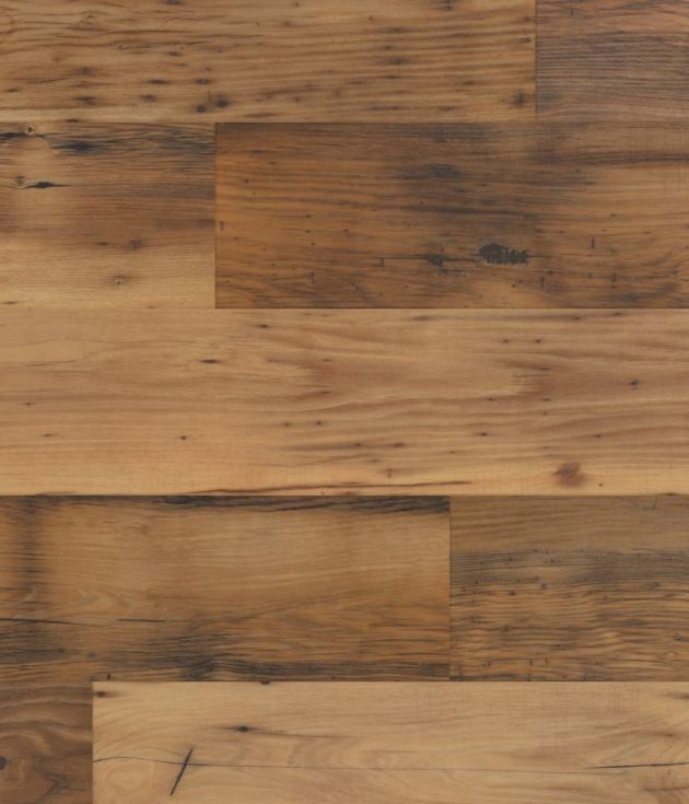Sample of Reclaimed Chestnut luxury vinyl plank, a brown, rustic woodgrain pattern with knots, cracks, and nail holes